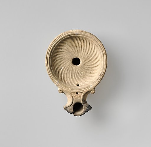 Terracotta oil lamp