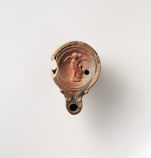 Terracotta oil lamp