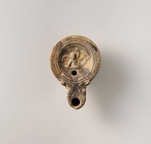 Terracotta oil lamp