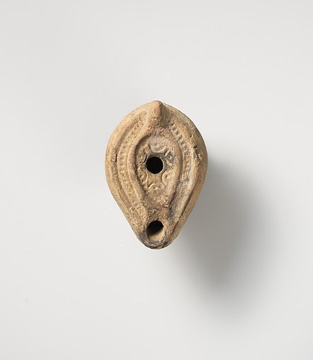 Terracotta oil lamp