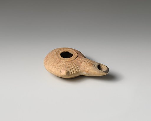 Terracotta oil lamp