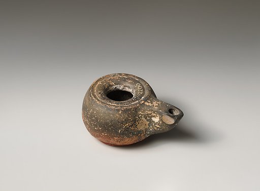 Terracotta oil lamp