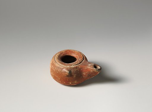Terracotta oil lamp