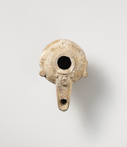 Terracotta oil lamp