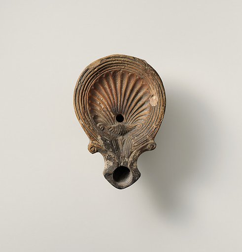 Terracotta oil lamp