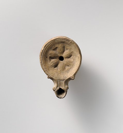 Terracotta oil lamp