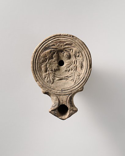 Terracotta oil lamp