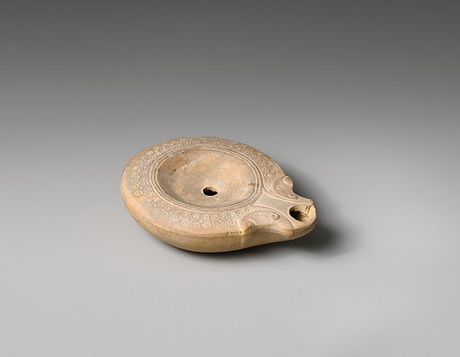Terracotta oil lamp