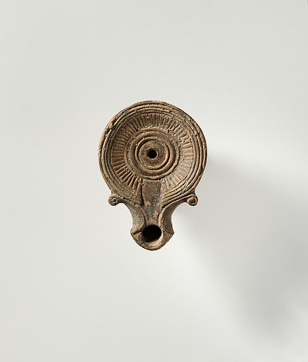 Terracotta oil lamp