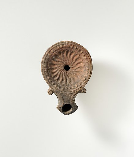 Terracotta oil lamp