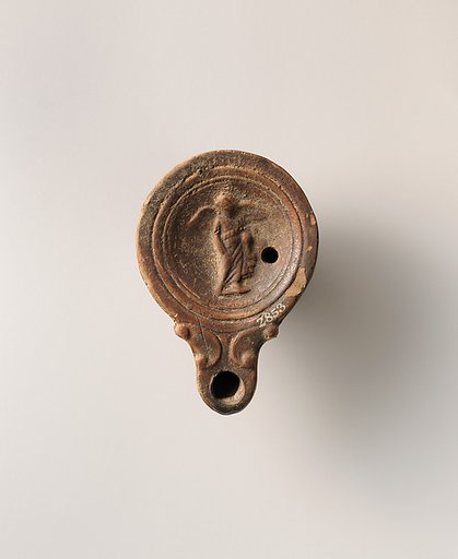 Terracotta oil lamp