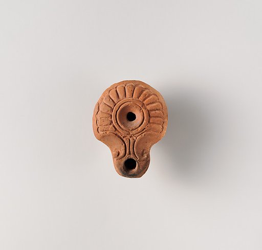 Terracotta oil lamp