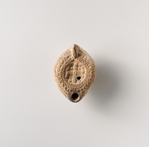 Terracotta oil lamp