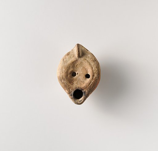 Terracotta oil lamp