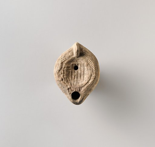Terracotta oil lamp