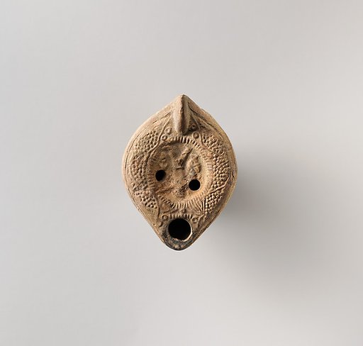Terracotta oil lamp