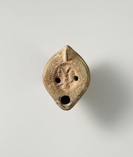 Terracotta oil lamp