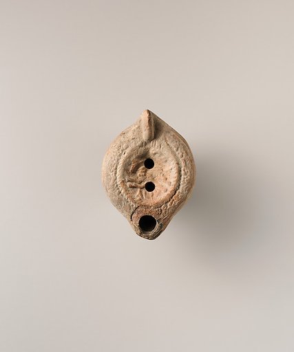 Terracotta oil lamp