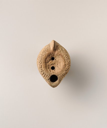 Terracotta oil lamp
