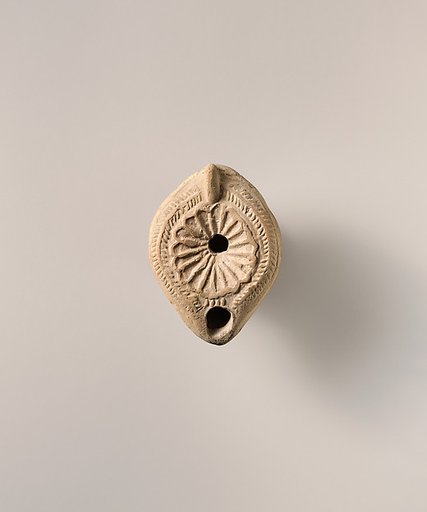 Terracotta oil lamp