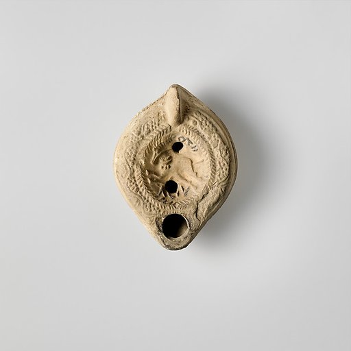 Terracotta oil lamp