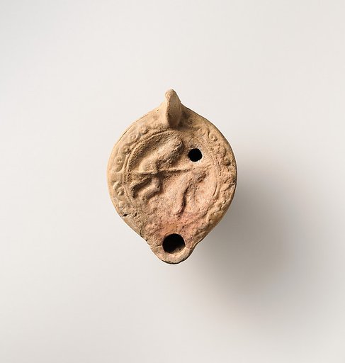 Terracotta oil lamp