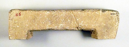 Limestone inscribed statue base