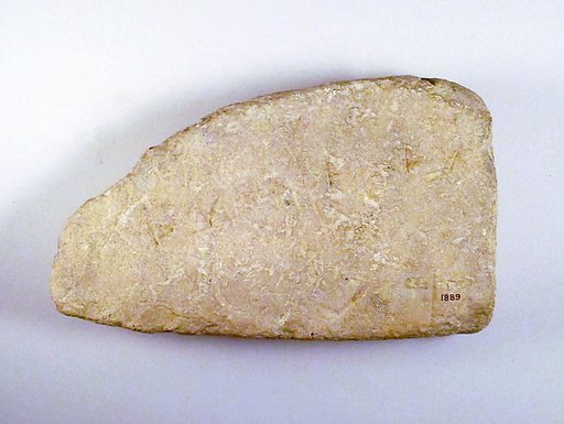 Limestone inscribed base
