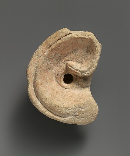 Limestone votive ear