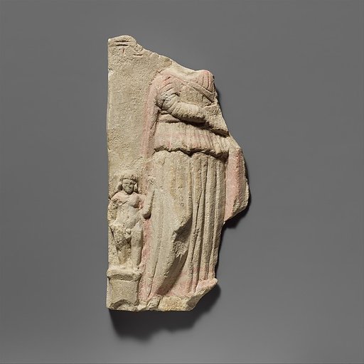 Limestone votive relief fragment