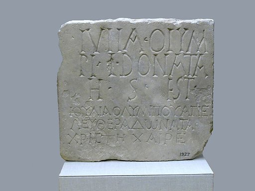 Limestone plaque with bilingual inscription