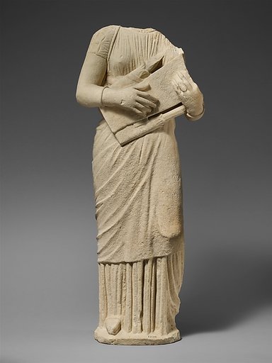 Limestone statue of a female lyre player