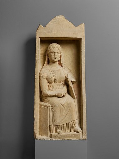 Limestone funerary monument with a seated woman