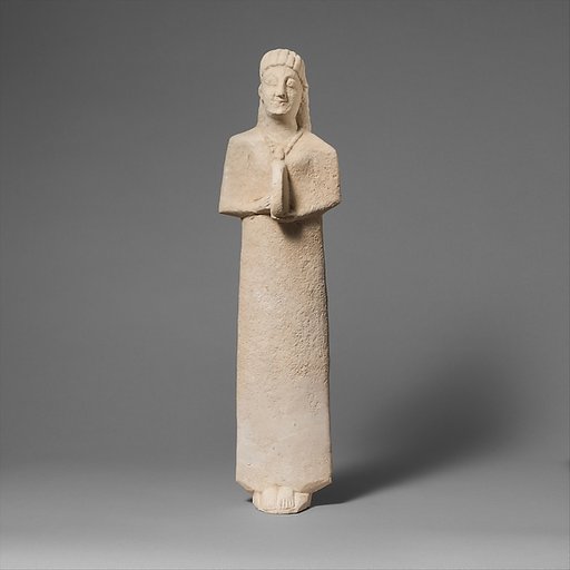 Limestone statuette of a female votary (worshipper) playing a tambourine