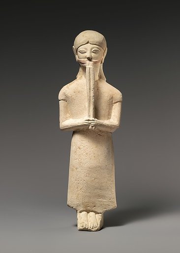 Limestone flute-player