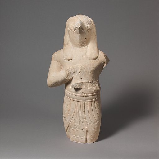 Limestone statuette of a male figure with Egyptianizing features