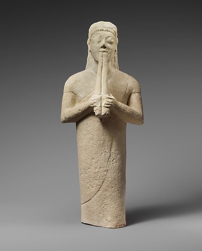 Limestone statuette of a male aulos player