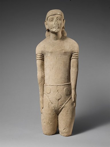 Limestone statuette of a male votary with Cypriot shorts and a diadem