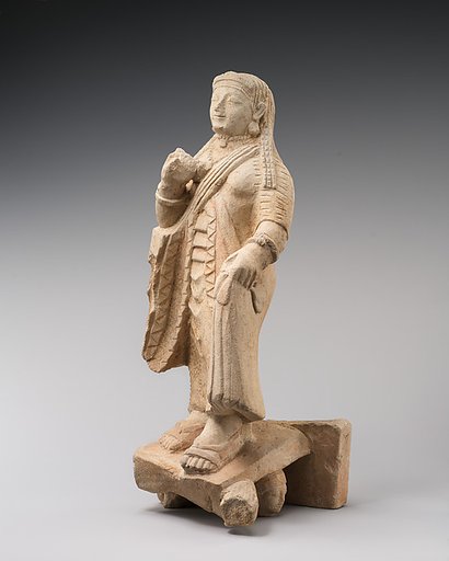 Limestone figure of a woman