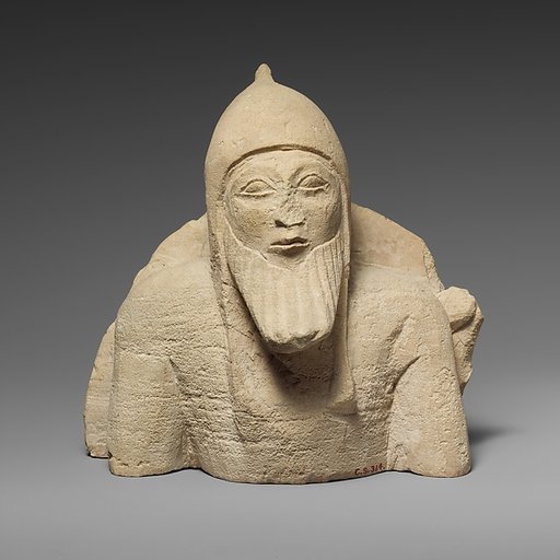 Upper part of a limestone warrior from a chariot group