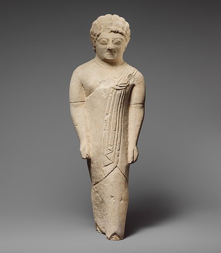 Limestone statuette of a beardless male votary in Greek dress