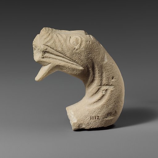 Limestone head of a snake