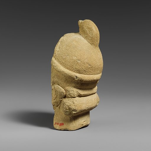 Fragment of a limestone head of the “Triple Geryon” (?)