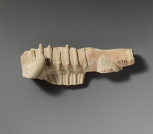 Limestone fragment of a lyre