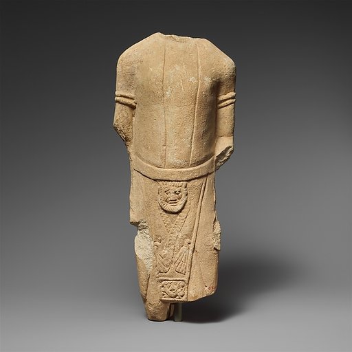 Limestone statuette of a male votary in Egyptianizing dress