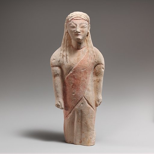 Limestone statuette of beardless male votary in Greek dress