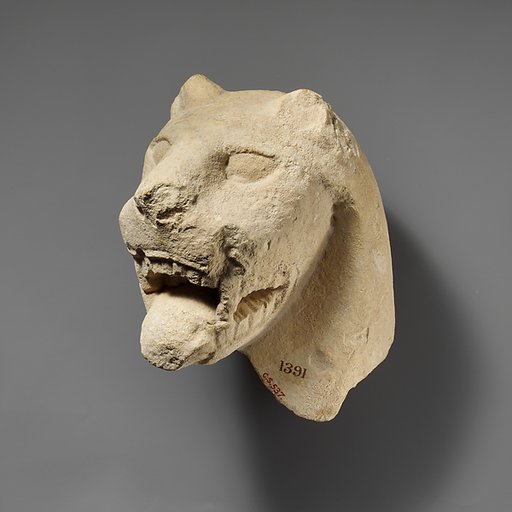 Limestone head of a lion from a votive stele (?)