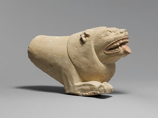 Limestone statue of a lion
