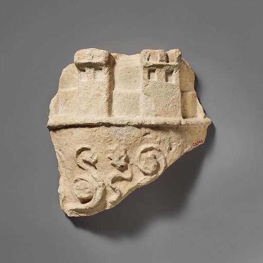 Fragment of a limestone crown belonging to a statue of the Great Goddess