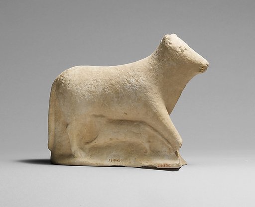 Limestone votive statuette of a cow and calf